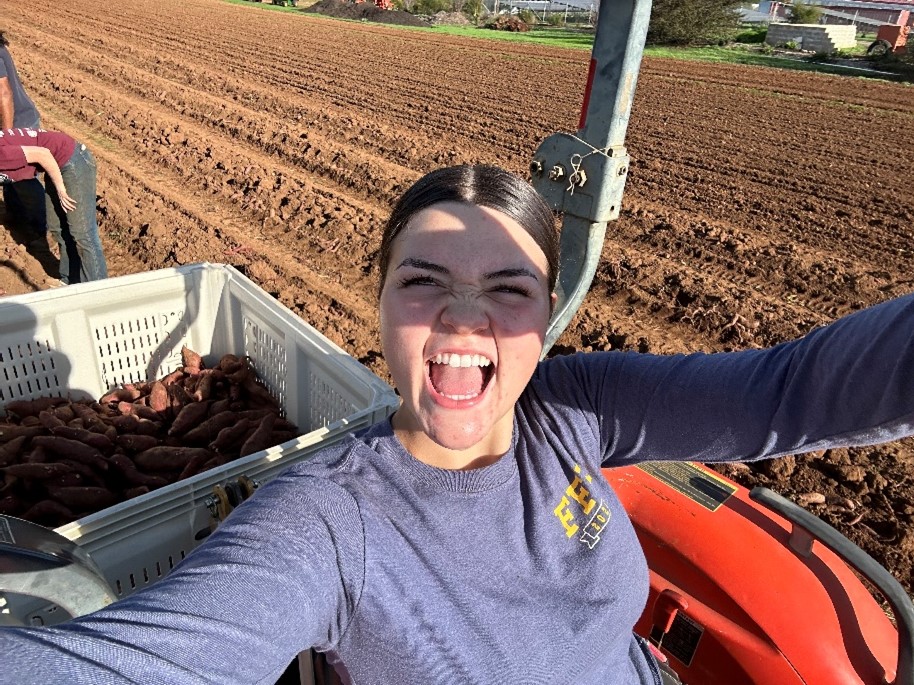 Shone Farm Student on a tractor
