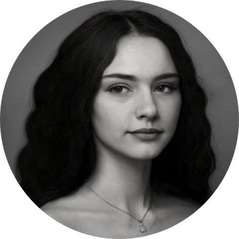 Black and White picture of young white woman with long wavy hair 